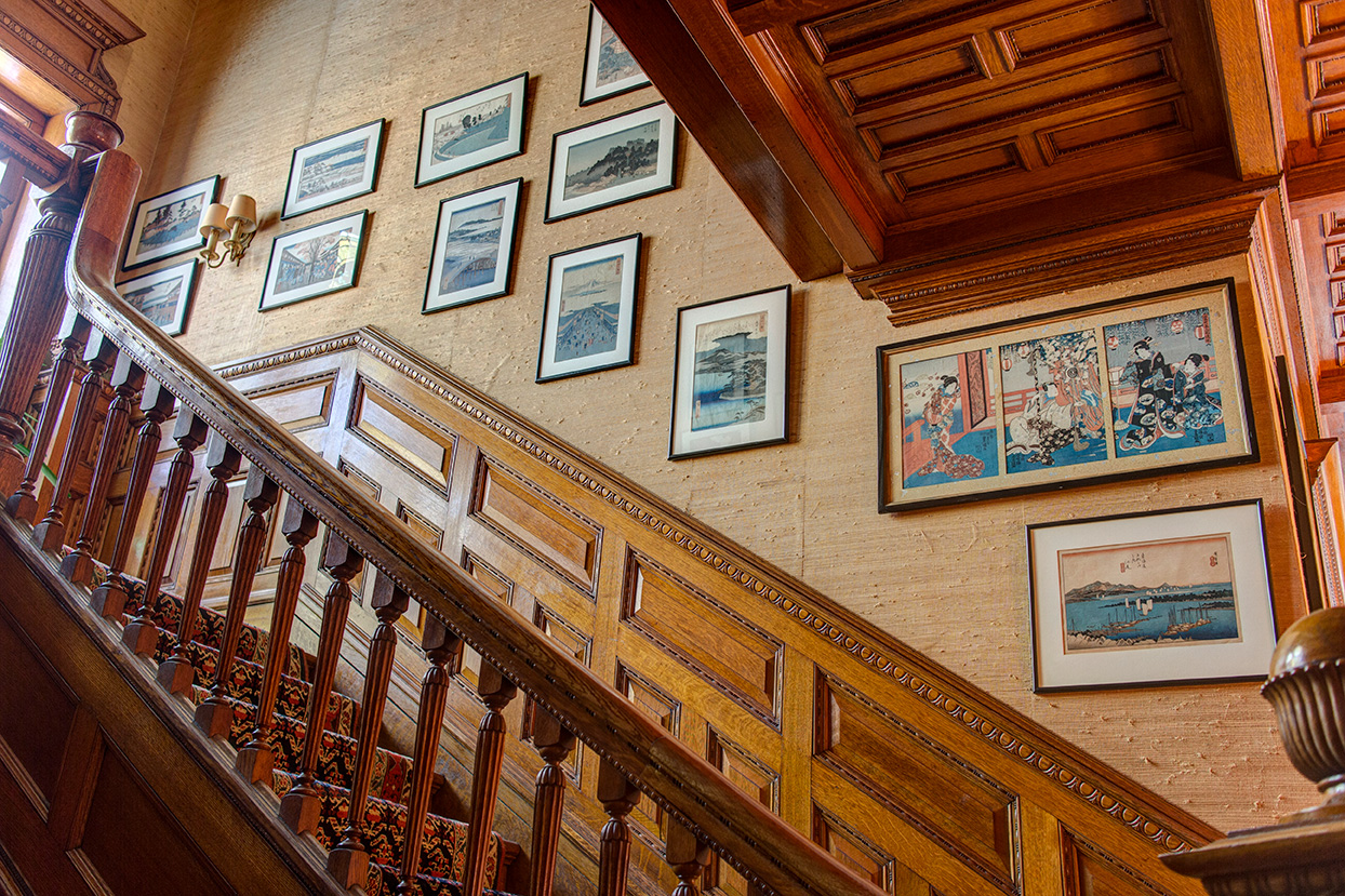 Hiroshige prints along the lower staircase